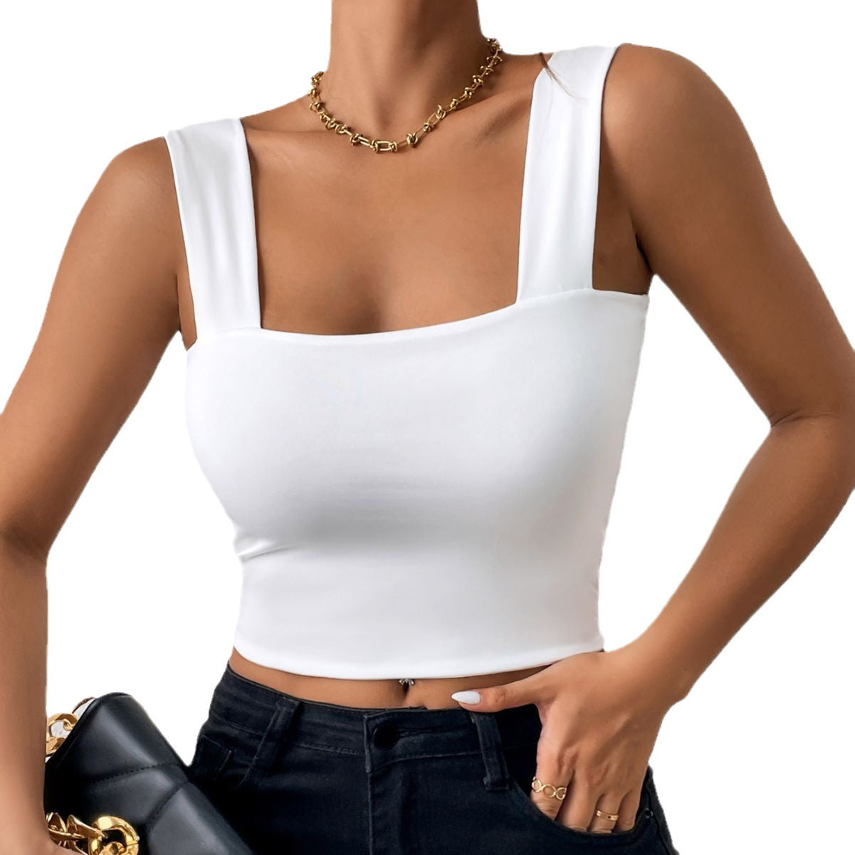 Sleeveless vest with wide shoulders and straps